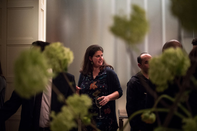 Becca Heller, 35, a founder of the International Refugee Assistance Project, attending a fund-raiser at the Seagram heir Charles Bronfman’s home in New York last month. Credit Hilary Swift for The New York Times