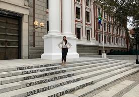Danielle standing in front of Parliament before going to sit in on the Department of Home Affairs Portfolio Committee Elections and meeting.